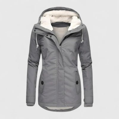 "Lourdes | Chaqueta de invierno impermeable con capucha" could be rewritten as: "Lourdes | Chaqueta de invierno con capucha y resistente al agua".