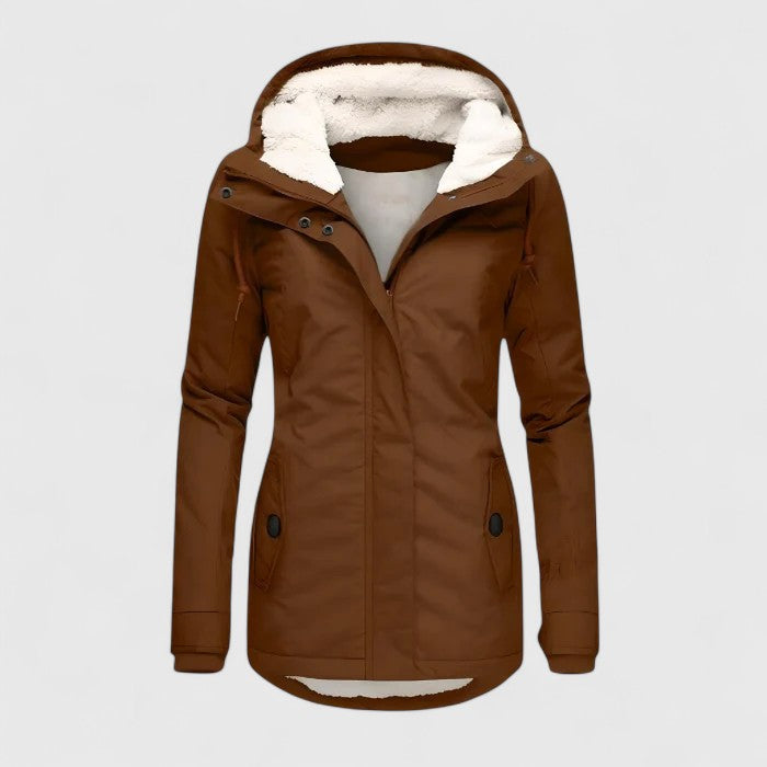"Lourdes | Chaqueta de invierno impermeable con capucha" could be rewritten as: "Lourdes | Chaqueta de invierno con capucha y resistente al agua".