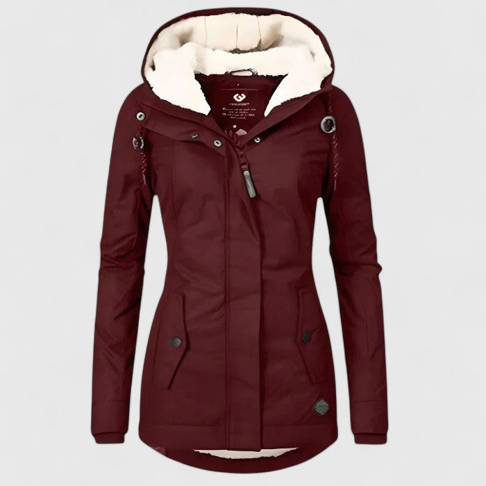 "Lourdes | Chaqueta de invierno impermeable con capucha" could be rewritten as: "Lourdes | Chaqueta de invierno con capucha y resistente al agua".